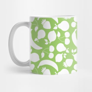 Fruit silhouettes on green background Mug